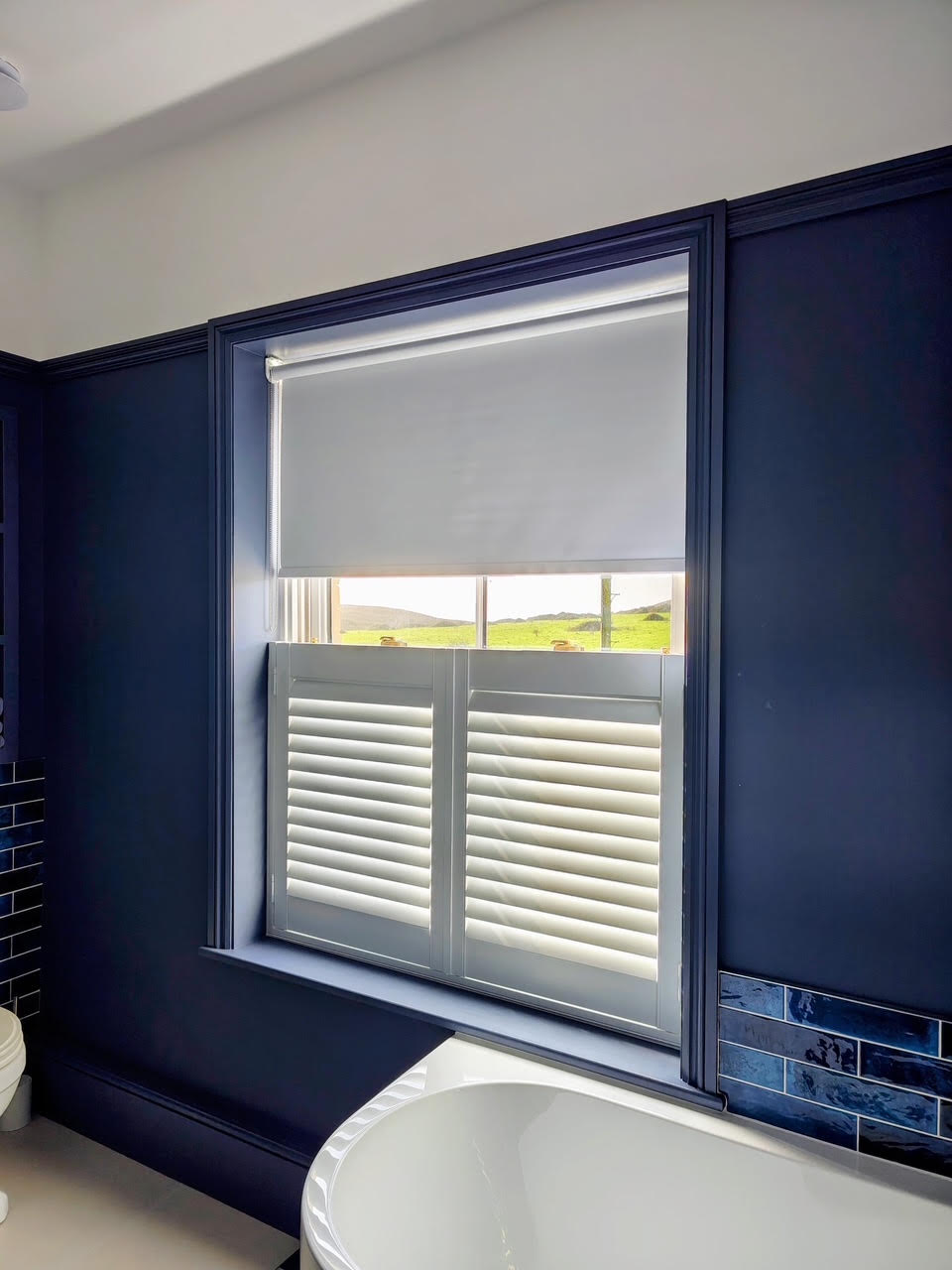 Café Style shutters with roller blind in a Freshwater bathroom